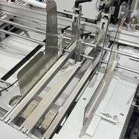 Applicateur automatique d'aimants pour boîtes rigides de bijoux, montres, vins, cosmétiques et cadeaux - Machine industrielle de pose d'aimants