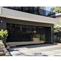 Porte de garage automatique sans cadre en aluminium et verre, design postmoderne Sunnysky Australia, pour villa et résidence, avec marque allemande.