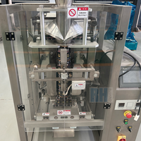 Machine d'emballage verticale automatique pour sachets stick, sachets souples et sacs à film roulé, pour le remplissage et la fermeture de particules, granulés, sel rose et sucre