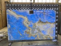 Dalle de marbre bleu onyx moderne de luxe panneau rétro-éclairé en pierre naturelle translucide de comptoir pour la décoration de la maison prix de gros