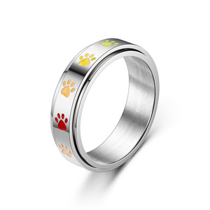 Anillo bonito con huellas de cachorro coloridas giratorias de acero inoxidable 2025 para Unisex - Product Image 2