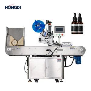 Etiquetadora automática de botellas redondas horizontales de alta precisión para envases químicos y cosméticos de bebidas - Product Image 1