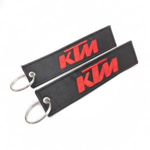Llavero de Tela Bordado Personalizado de Doble Cara con Etiqueta Personalizada de Alta Calidad X926, con Texto o Logotipo - Product Image 4