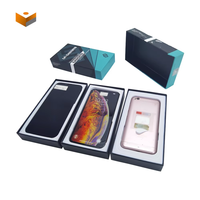 Boîte de téléphone vide en carton imprimé avec motif de couleur et logo personnalisé avec plateau de câble de données en plastique