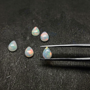 Ópalos Blancos Naturales Etíopes de Alta Luminosidad, Forma de Pera Lisa, Cabujones de 7*9 mm, Oferta al por Mayor a Precio de Mayoreo, Compre Joyería en Línea - Product Image 1