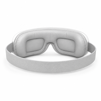 Masque de massage oculaire pliable OEM ODM à pression d'air avec compresse chauffante, vibrations et musique, rechargeable, pour la vente en gros
