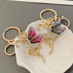 New Metal Diamond Dance Wings Girl Keychain High End Accessories Bag Pendant Car Keyring Small Jewelry <b>Key</b> <b>Chain</b> - Product Image 1