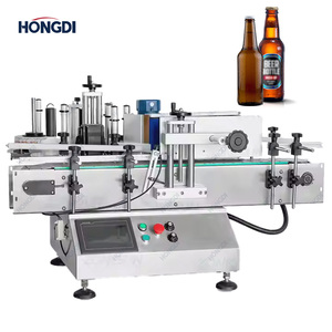 Machine d'étiquetage manuelle pour bouteilles en verre rondes de boissons, cola et vitamines, cartons/boîtes d'emballage - Product Image 1