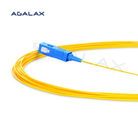 Pigtail Optik Single Mode High-Performance SC/UPC 9/125m 0.9mm LSZH Kuning Simplex Tight-Buffered dengan Kehilangan Penyisipan Rendah untuk FTTX/Data