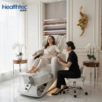 Fauteuil de pédicure de luxe blanc avec pompe de vidange automatique pour salon de manucure