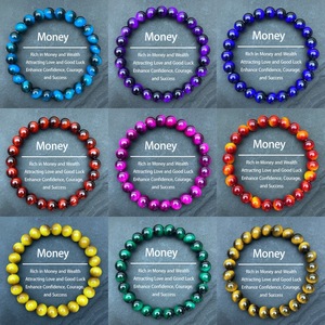 Le bracelet DAISY xiaod en vert, violet, bleu saphir, rouge, rose, bleu lac doré et jaune œil de tigre est un cristal très prisé. - Product Image 1