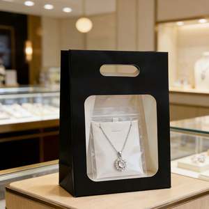 Sacs cadeaux personnalisables en papier kraft avec bordure noire, fenêtre transparente et poignées découpées pour petits cadeaux et desserts - Product Image 4