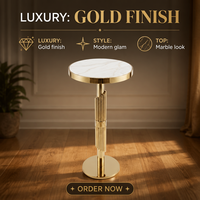 Table d'appoint ronde haute moderne à rainures verticales, avec plateau en verre et pied unique en acier inoxydable, idéale pour les mariages et salons.