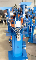 Machine à œillets à double tête Machine à poinçonner automatiquement les boutons de fixation de haute qualité