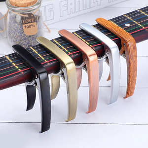 Capo para Guitarra Acústica/Eléctrica de Aleación de Zinc Resistente de Alta Calidad Battle Wolf con Agarre Fuerte - Varios Estilos de Color al por Mayor - Product Image 4