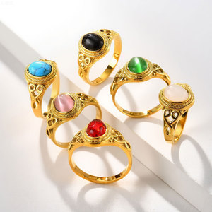 Anillo vintage de acero inoxidable chapado en oro para mujer, con cabujón ovalado de piedra natural multicolor y marco hueco tallado. - Product Image 1
