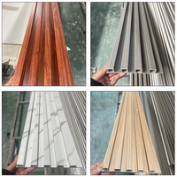 Panneau mural géométrique rainuré en WPC de qualité supérieure au design moderne, facile à installer, résistant à l'humidité, pour la décoration extérieure et intérieure.