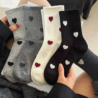 Chaussettes décontractées mi-mollet confortables pour femmes, style automne ; tons noir, blanc, gris, design polyvalent et simple, antidérapantes, en polyester