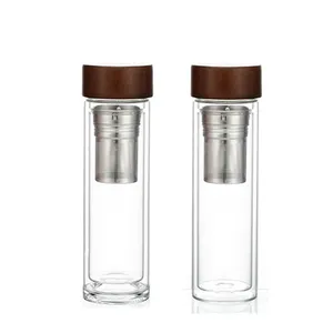 Çift katmanlı temperli cam su şişesi ile ahşap kapak ve bambu kap