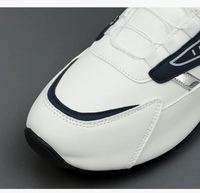 Baskets pour hommes à bouton rotatif, style color block, chaussures de sport décontractées, confortables et respirantes pour la course et le quotidien