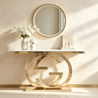 Table console de luxe à double anneau entrelacé avec base sur piédestal, plateau en marbre, table d'entrée en acier inoxydable, table de décoration artistique moderne