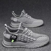 Nouvelles baskets décontractées pour hommes, style sportif, à lacets, en maille souple respirante, semelle extérieure en caoutchouc, à rayures, modèle Coconut, tendance mode Joker, noires