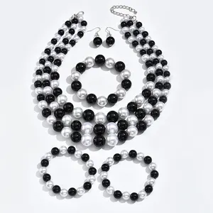 Xinting-Conjunto de pendientes y pulsera para mujer, joyería de cinco piezas, collar blanco y negro perla