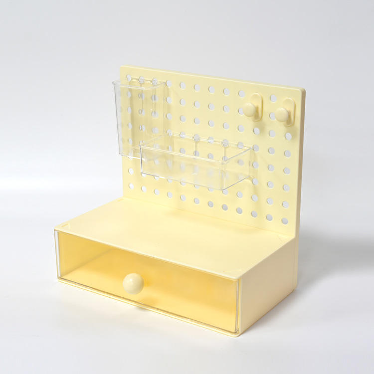 Boîte de rangement jaune pour panneau perforé