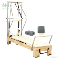 Reformer Pilates en chêne, équipement de fitness multifonctionnel en bois clair pour studio de Pilates esthétique