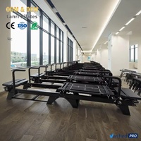 Machine de Pilates Reformer Xformer réglable et durable pour l'entraînement professionnel en studio de fitness