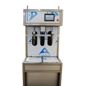 Riempitrice semi automatica/riempitrice quantitativa autofluida/attrezzatura per inscatolamento a pressione pasta di miele - Product Image 1