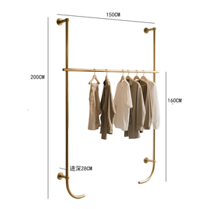 Présentoir mural haut de gamme en acier inoxydable doré et titane pour magasin de vêtements pour femmes - Product Image 5