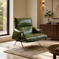 Fauteuil lounge italien contemporain à dossier haut en cuir, avec structure en acier inoxydable poli miroir, courbée en X et en forme de barre plate
