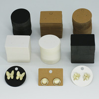 Supports à boucles d'oreilles en carton uni en gros, disponibles en noir, blanc et marron