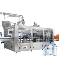 Machine de remplissage de bouteilles PET hautement automatique et à haute efficacité, 15000 bph, matériaux SUS304/316, PLC + écran tactile, précision de 99,9 %, pour boissons
