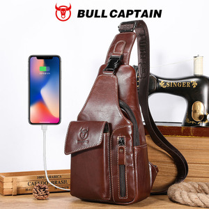 กระเป๋าคาดอกหนังแท้สไตล์วินเทจ BULLCAPTAIN สำหรับผู้ชาย พร้อมพอร์ตชาร์จ USB ช่องใส่ของหลายช่อง กระเป๋าสะพายข้างแบบครอสบอดี้ กระเป๋าเดินทางสะพายไหล่ - Product Image 1