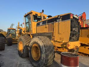 Niveleuse Caterpillar 16H d'occasion à bas prix, jaune, robuste, garantie 6 mois, modèle original pour l'entretien des routes minières - Product Image 1