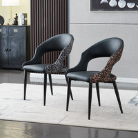 Chaise de salle à manger à structure en acier avec accents en tissu imprimé léopard en cuir résistant aux taches de qualité supérieure
