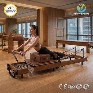 Reformer de Pilates Joyfit en Roble Marrón Oscuro con Cuero Chocolate para Estudio Profesional, Gimnasio, Suministro al por Mayor OEM - Product Image 1