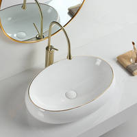 Lavabo en céramique blanc crème de qualité hôtelière de luxe avec motif artisanal pour projet de salle de bain d'hôtel de charme