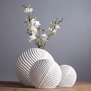 עיצוב נורדי בית בעבודת יד בסגנון מינימליסטי עגול לבן עלה צורת מרקם מודרני עגול פורצלן עציץ קרמיקה פרח אגרטל