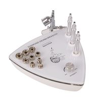 Système de polissage cutané à domicile par dermabrasion au diamant et jet d'oxygène : stimule l'absorption des essences et élimine les points noirs