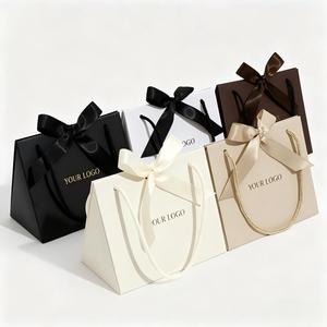 <span class=keywords><strong>Bolsa</strong></span> <span class=keywords><strong>de</strong></span> Papel <span class=keywords><strong>para</strong></span> Compras Youen con Logotipo Personalizado, <span class=keywords><strong>de</strong></span> Lujo, Color Blanco Crema, Plegable, <span class=keywords><strong>para</strong></span> Anillos, Pulseras, Collares, con Cinta - Product Image 1