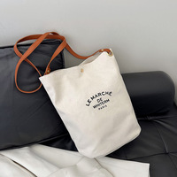 Sac fourre-tout à bandoulière avec logo personnalisé en toile de coton blanc avec poignées en cuir réutilisable pour le déjeuner, le travail et le shopping excellente idée cadeau