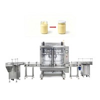 Machine de remplissage et d'emballage volumétrique de liquides pour capsules, azote, huiles essentielles, petites bouteilles, chocolat comestible et désinfection