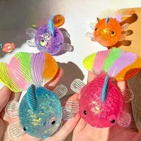 Jouet Squishy Poisson Rouge Arc-en-ciel Scintillant Effet Maltose, Balle à Presser Transparente Sensorielle Anti-Stress
