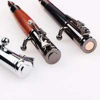 Stylo en forme de balle à action par culbuteur au design créatif, avec logo personnalisé en métal, design de fusil, clip pour cadeau d'affaires