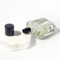 Bouteille de parfum d'atomiseur de parfum de luxe de luxe plat clair 100ml emballage en verre de forme unique bouteille de parfum vide
