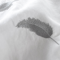 Nouveau T-shirt en coton style unisexe à manches courtes avec broderie plume