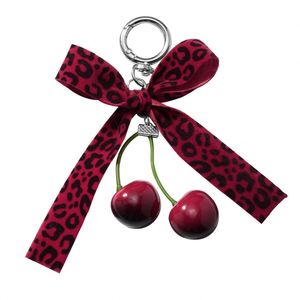Porte-clés tendance en dentelle avec nœud papillon et pendentif cerise, breloque bijou pour filles et femmes, cadeau idéal - Product Image 5